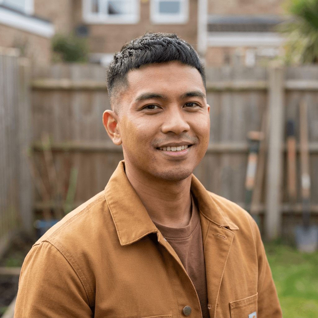 Ahmad Faizal, a Malaysian takaful professional in a business suit, appears confident and approachable